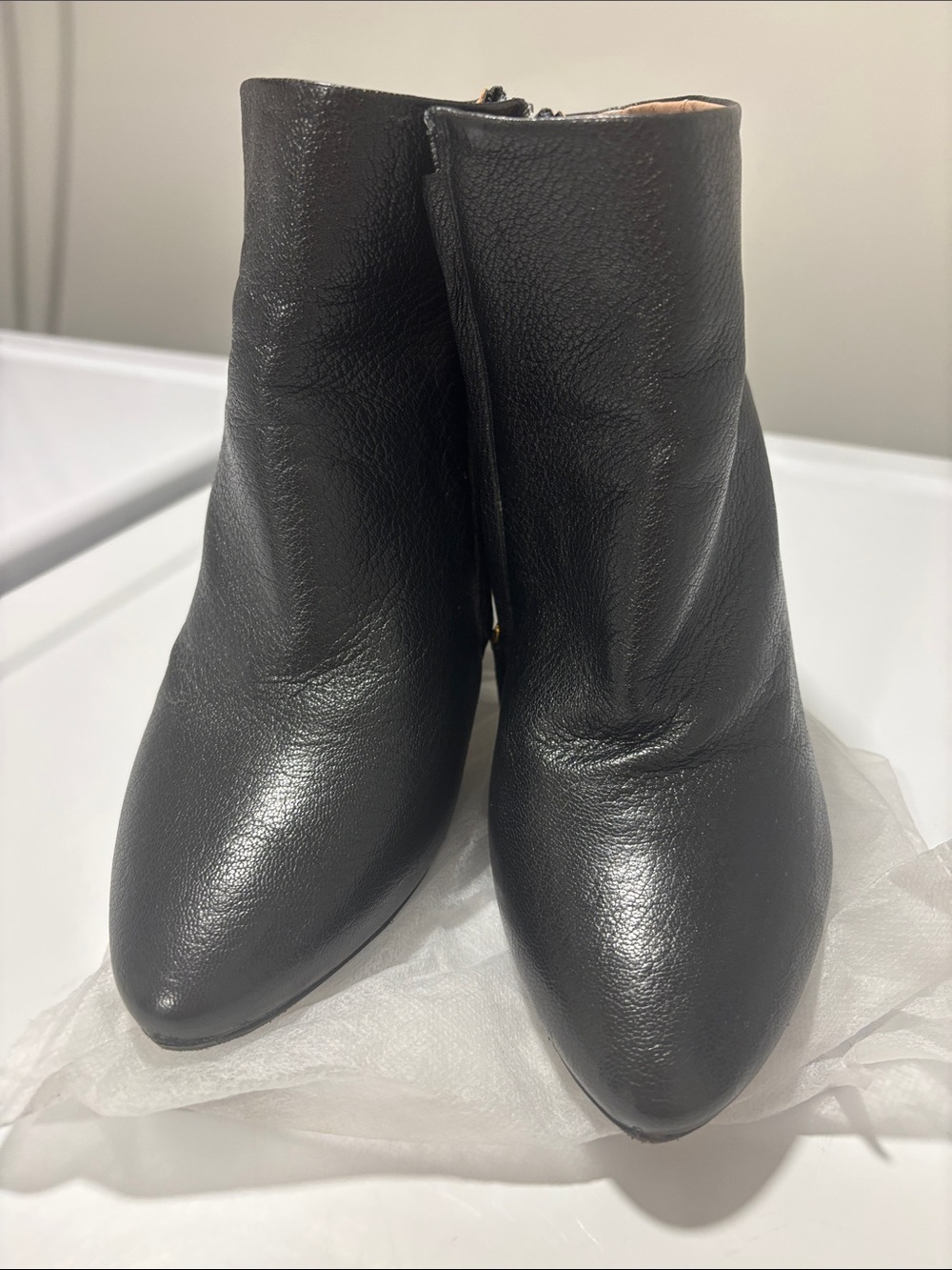 Classic Chloe Black Leather Ankle Boots - Sleek Zip Closure with gold accent